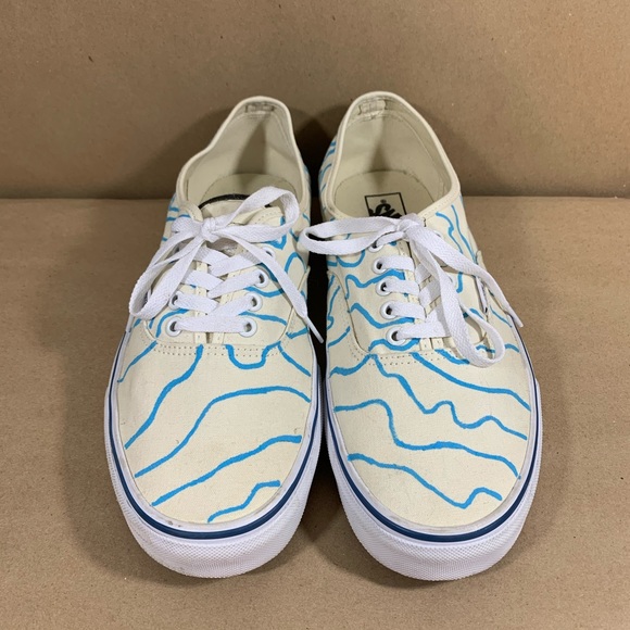 white vans with blue line